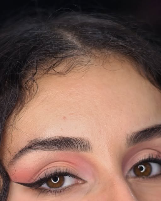 Pink eyeshadow and winged eyeliner makeup by Marta, London makeup artist